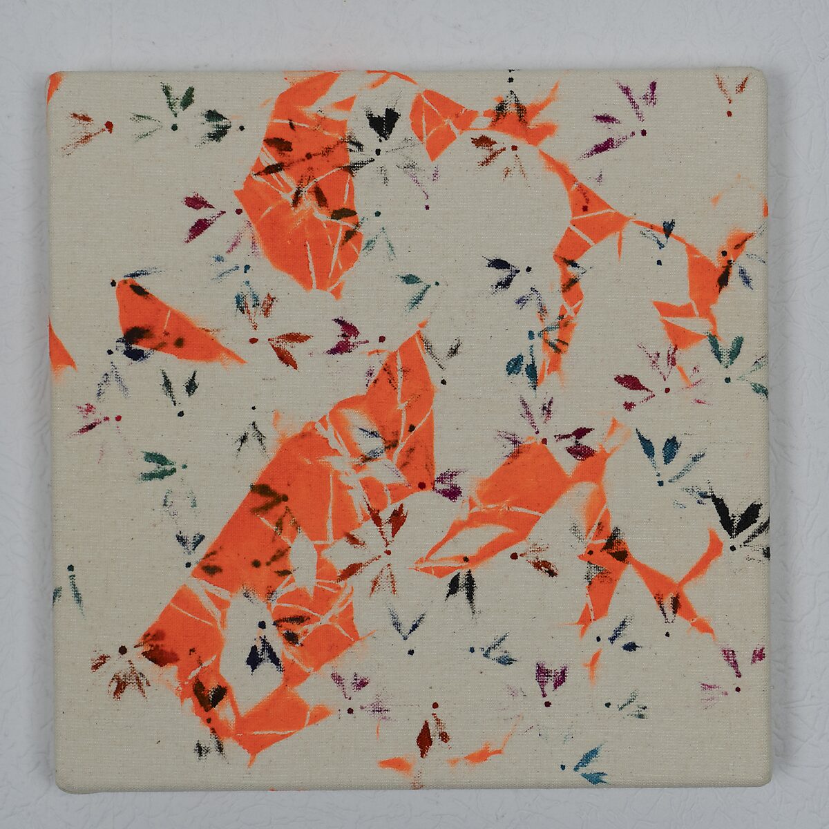 Drawings — Remaining Ink Cloths — drawing where a circular movement of orange ink prints encloses the centre of the canvas, surrounded by small colour traces.