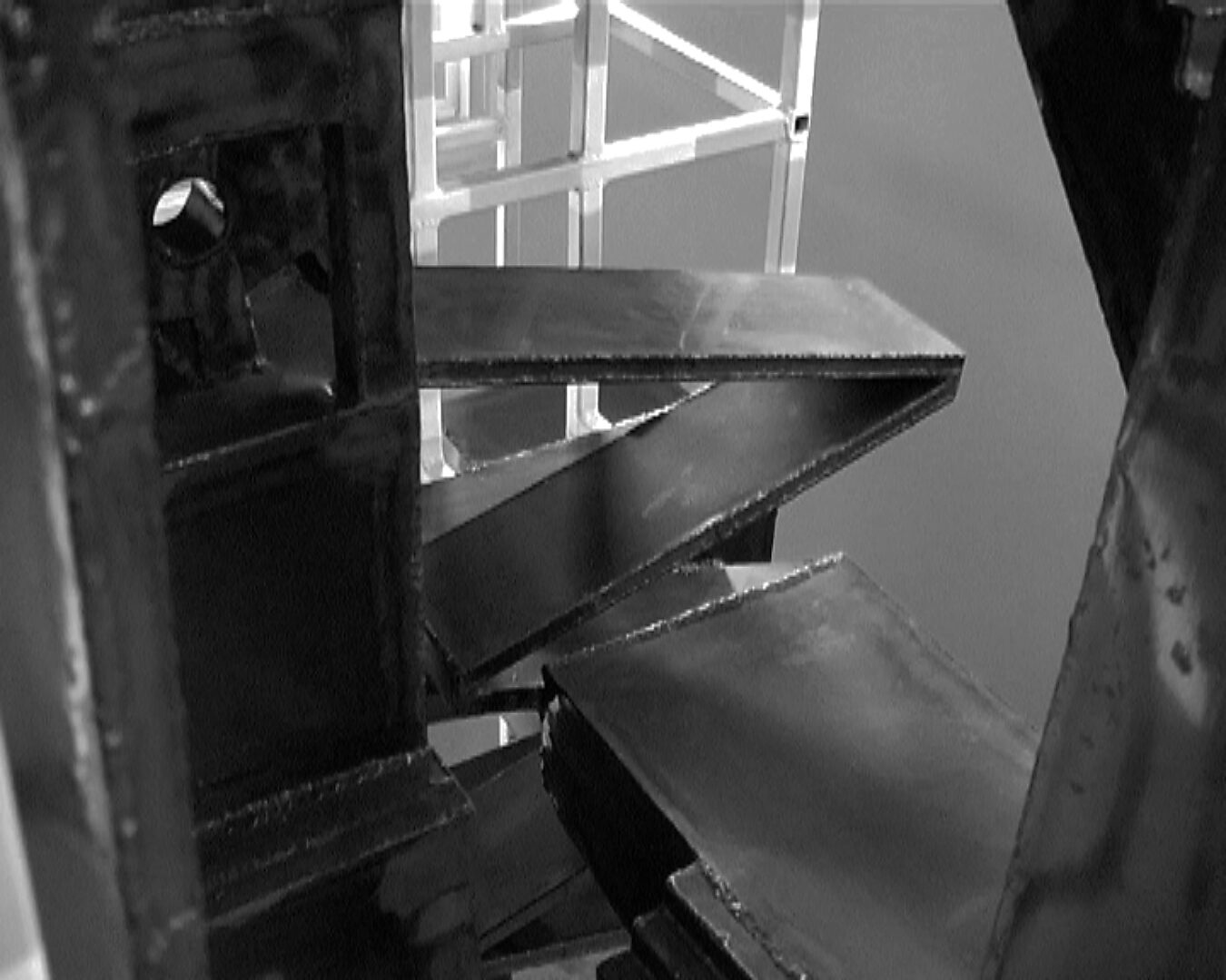 Big Brother in Malfunction — video still of Experimental Setup for Flat People, an early version of Construction with Blue, where inclined planes and passages form a controlled space of movement.
