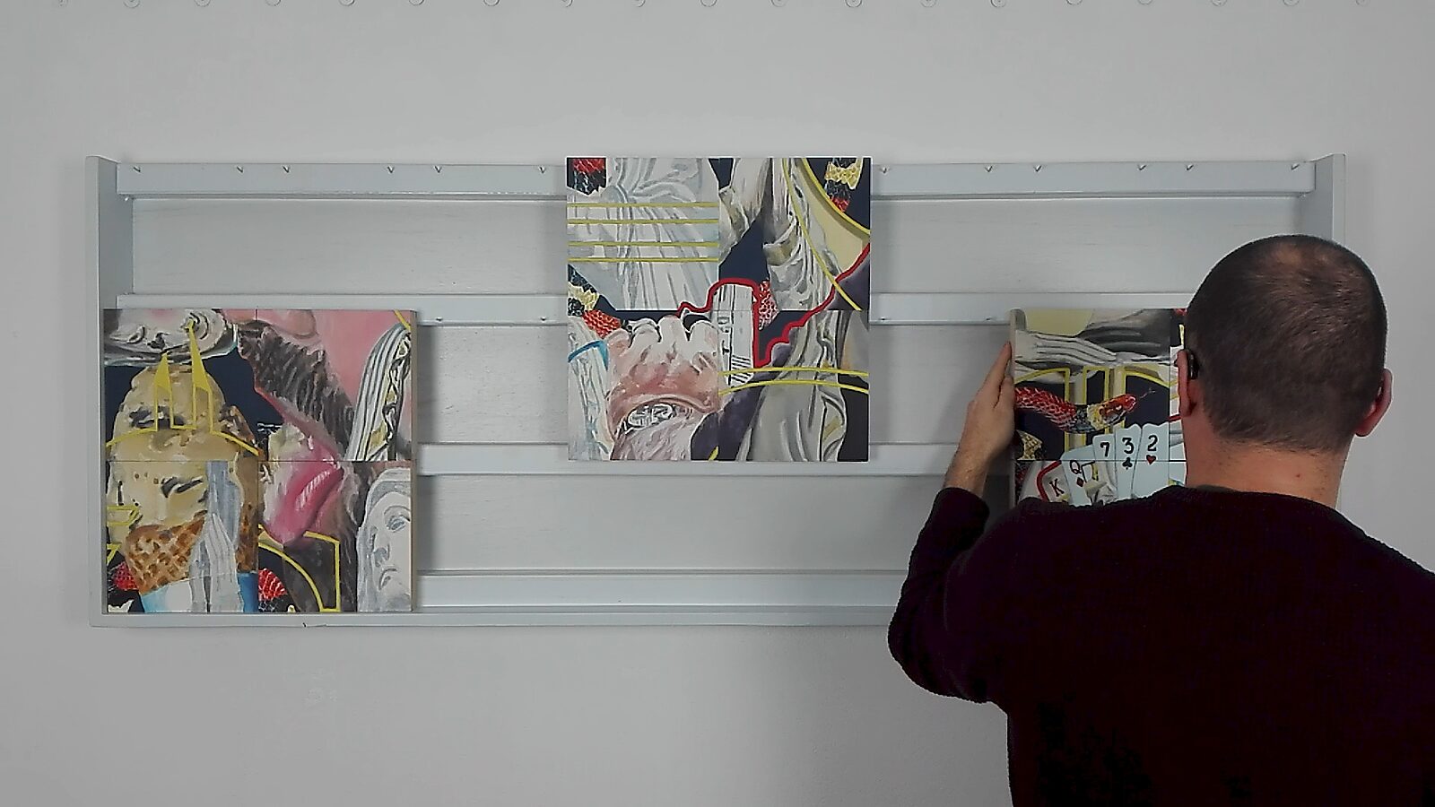 Variations with Two Marys — action videostill: the panels are separated and regrouped into a few larger clusters, bringing together fragments of figures and patterns.