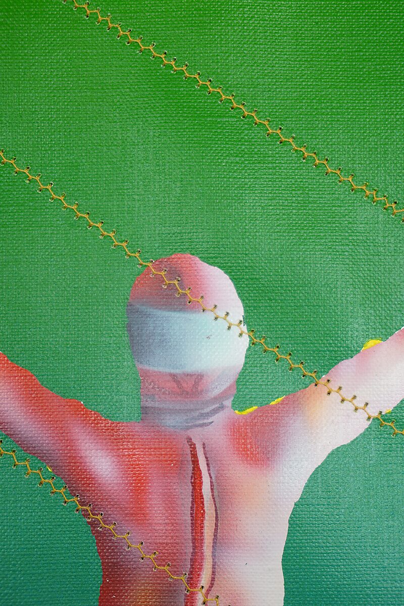 Smeltende doelen nr. 4 — MT.4.7 Herrijzenis van Oekraïne, detail van de ingenaaide figuur waarbij de stiksels zichtbaar zijn in het doek.
