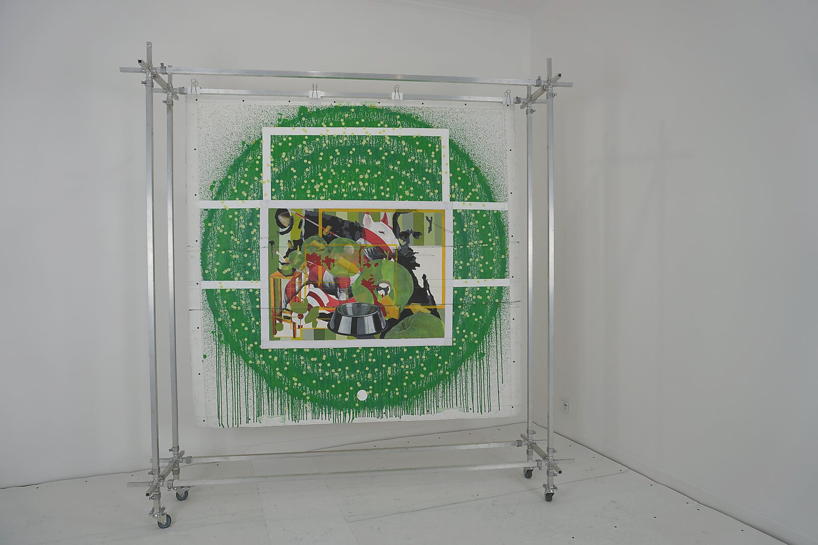 MT.4.8. Scoring with Goals — two paintings from the series Information Overload are stretched in a mobile aluminium construction; around the central image a green circular paint field with splatters evokes a football goal and target zone.
