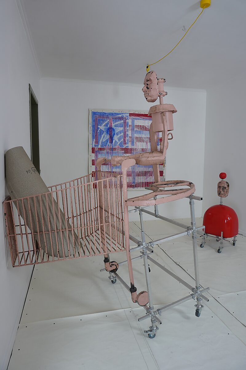 Temporary studio installation of Vintage Cyborg Shopping Cart (1960 model) sculpture, cyborg figure mounted on aluminium frame with chair support.