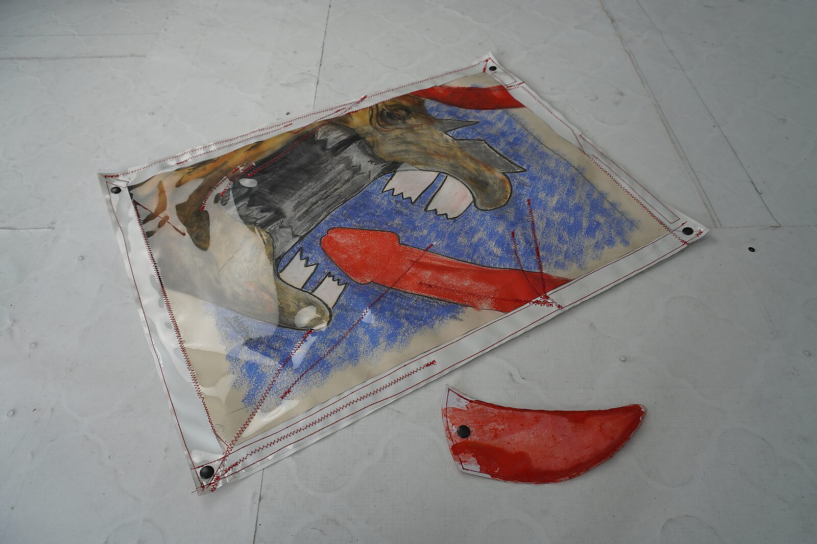 Signature of a Rhinoceros — process photo: drawing sewn between layers of fabric and transparent plastic.