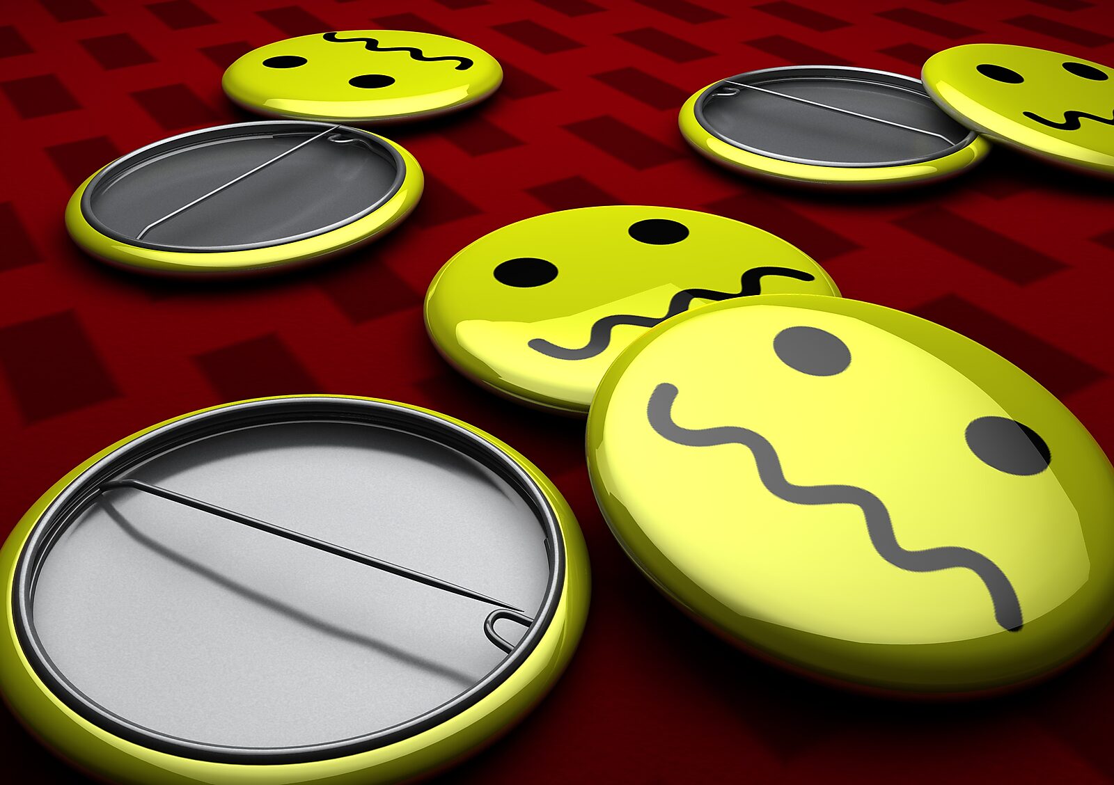 The Modern Cavemen — detail of yellow emoji buttons with different facial expressions on a red grid background; the smiling and frowning masks refer to standardized emotion and public identity.