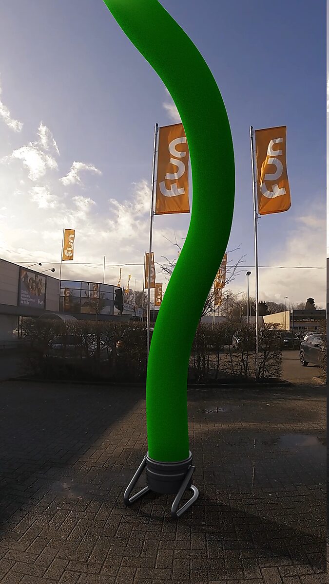 Resistance of a Skytube — videostill detail of the undulating form of the skytube while the flags in the background flap intensely in the wind.