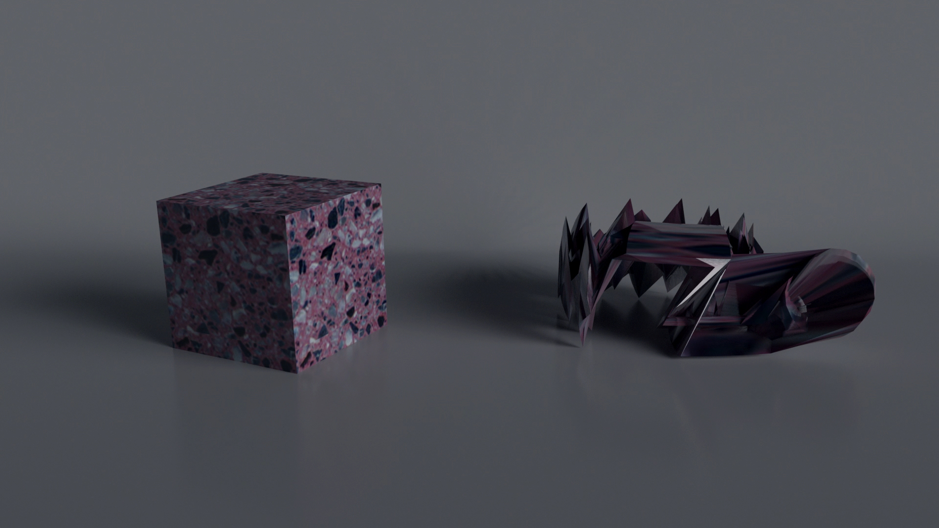 To Be the Other — videostill in which the fragmented form lies next to the cube, as if the object has broken apart during the transformation.