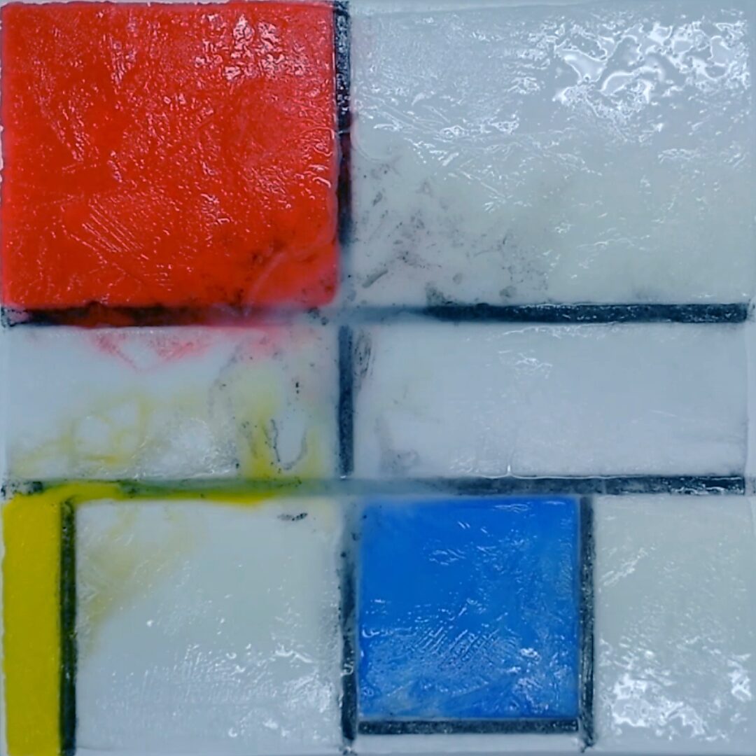 Back to Nature with Piet Mondrian No. 1.2 — process photo showing the ice melting further; water and pigment slowly spreading within the sections of the grid.