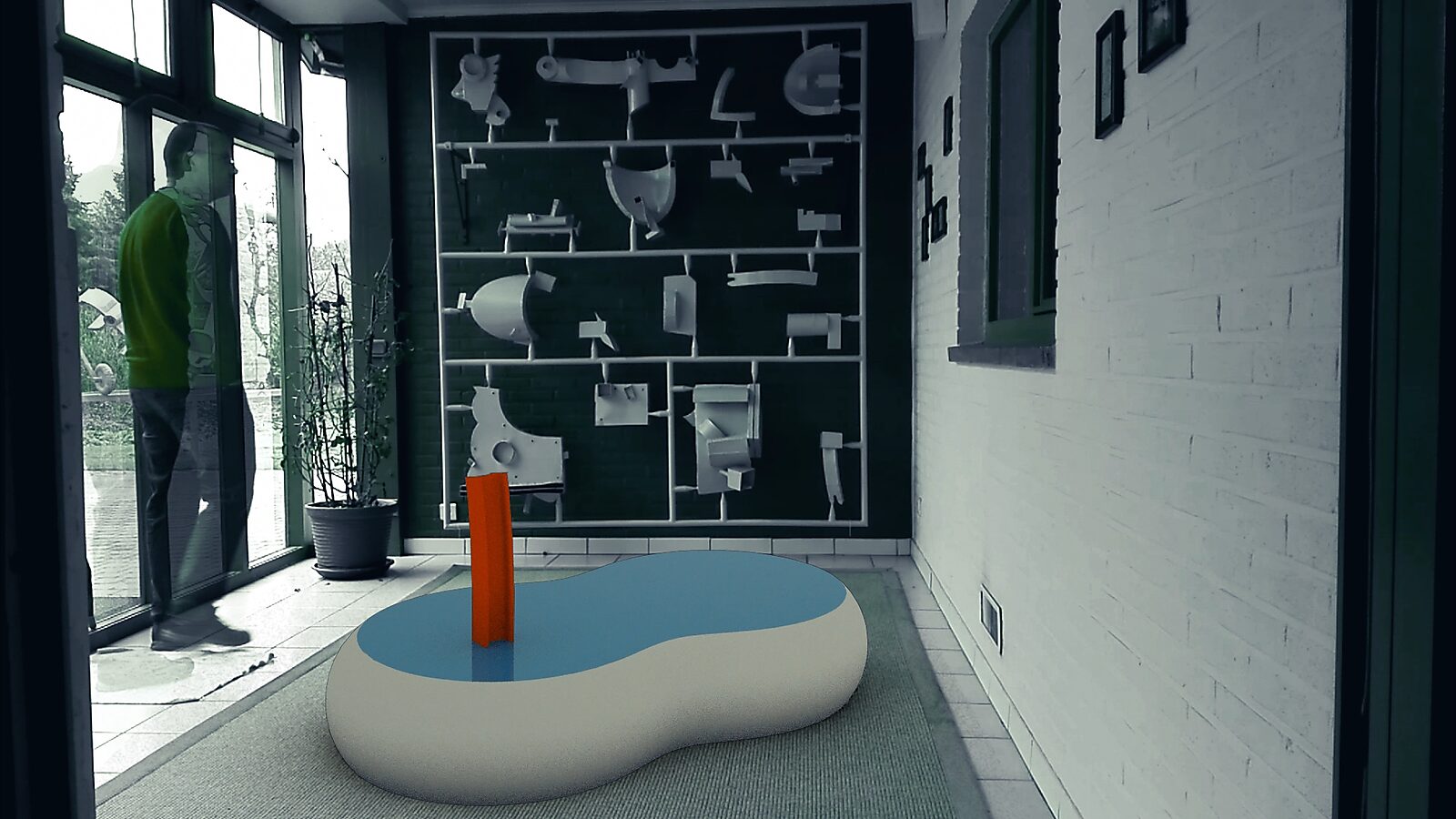 IJzerschets — videostill uit een 3D-animatie waarin een eerste rechtopstaand rood element verschijnt op een zachte, organische sokkel in een interieurruimte.