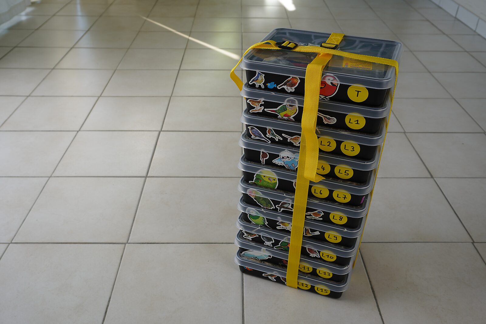 St. Sebastian with Birds No. 2 — process photo of stacked storage boxes containing mould parts, labelled by layer.