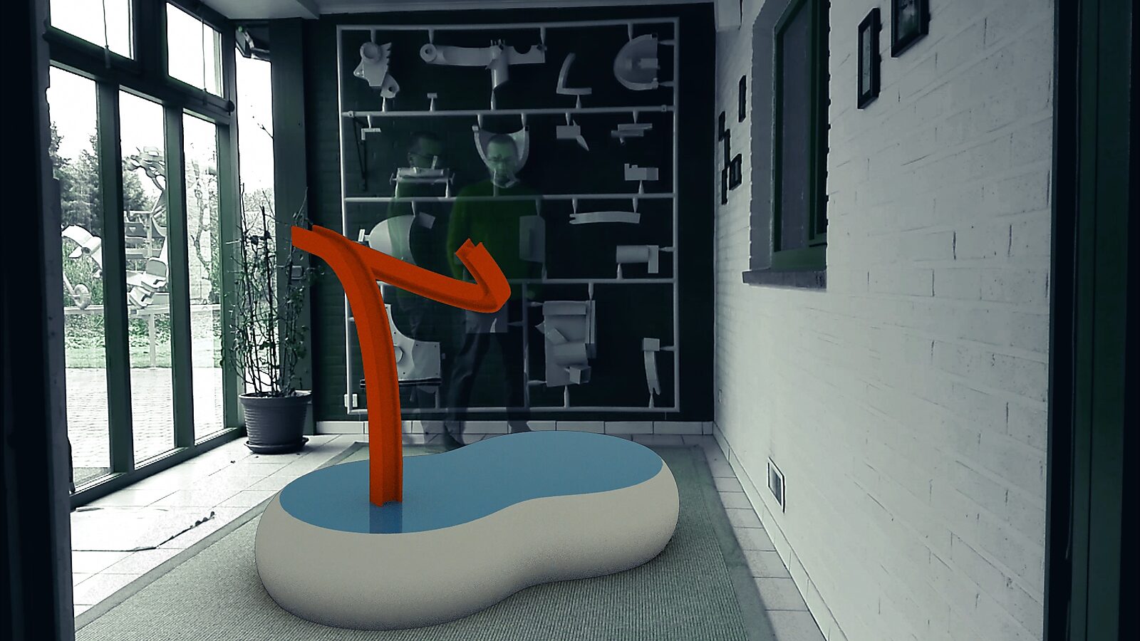 Iron Sketch — video still in which the red element begins to bend and extend, as if a line is being drawn through space.