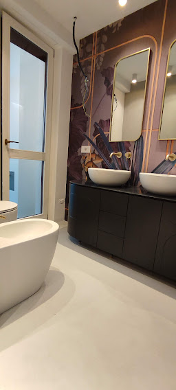 resinatura pavimenti e pareti bagni , senza la demolizione di piastrelle, resine artistiche Milano, resine poliuretaniche e resine Epossidiche ad alte prestazioni.