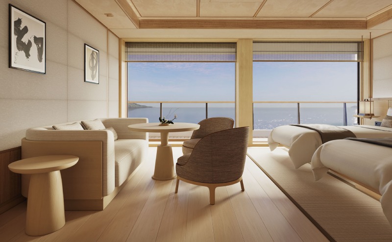 Aman at Sea Amangati Deluxe Suite Wohnbereich Couch und Stuhl
