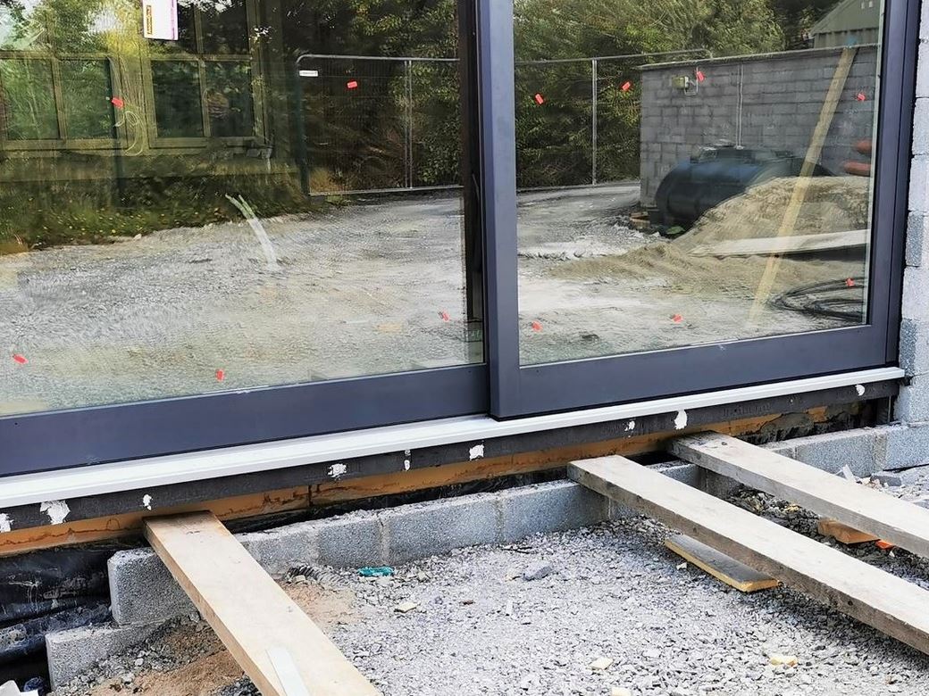 The Detail: The 180mm deep Triotherm has been bonded and mechanically fixed to the edge of the concrete floor. No additional structural support is required.