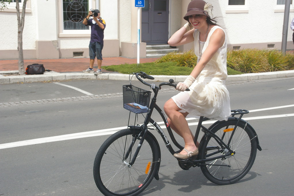 Another frock wearer on another bike