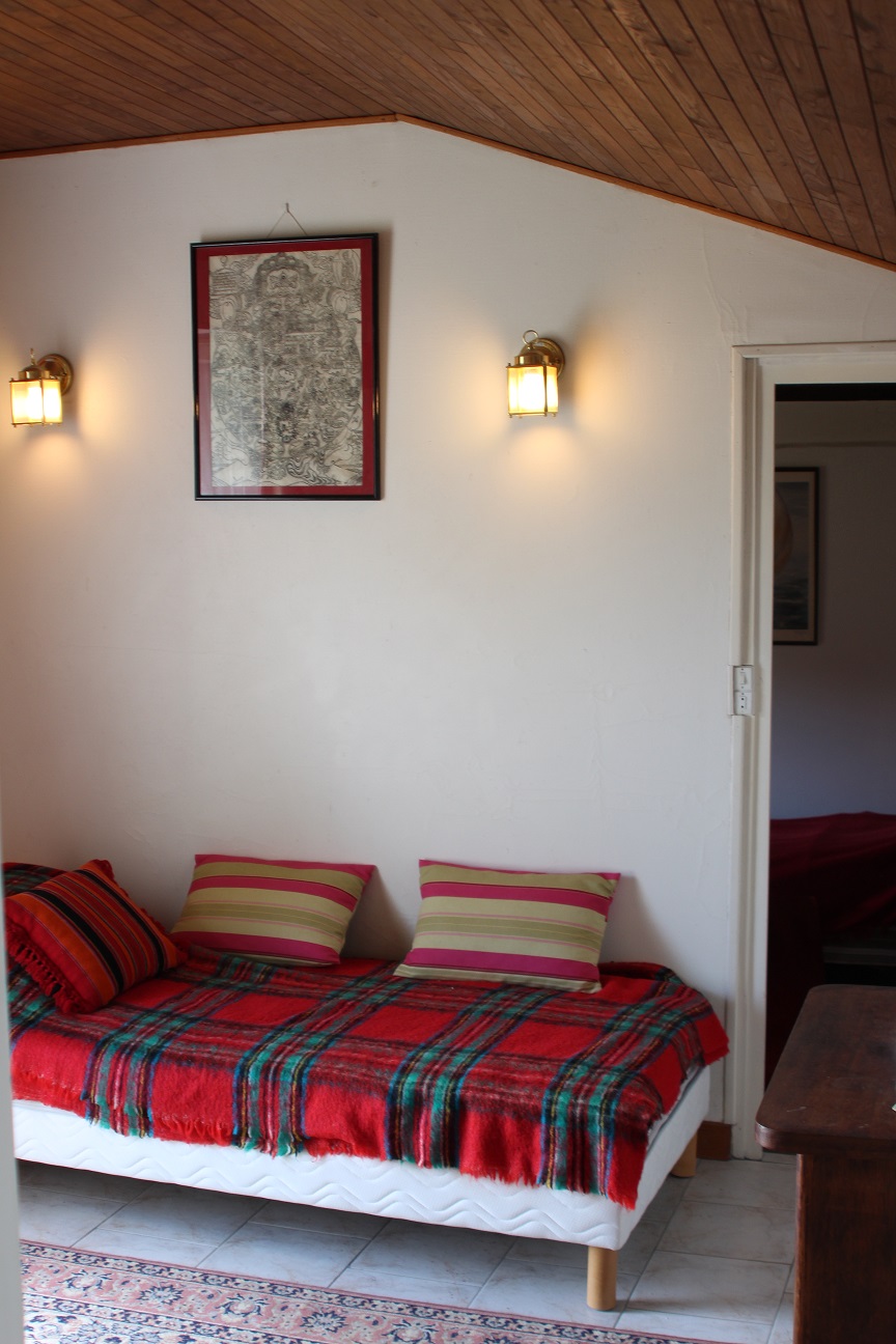 On the ground floor, bedroom n ° 1, with one bed and view of the entrance to the next bedroom