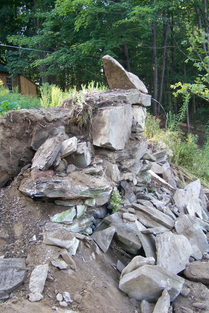 Starting to deconstruct the precarious wall