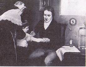 図１．子供に牛痘接種するジェンナー