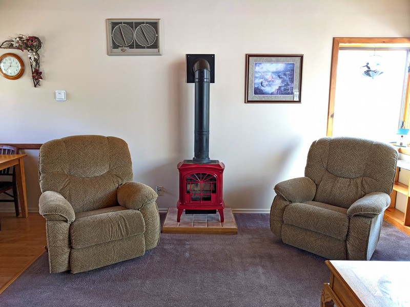 Living room w/wood stove sitting area