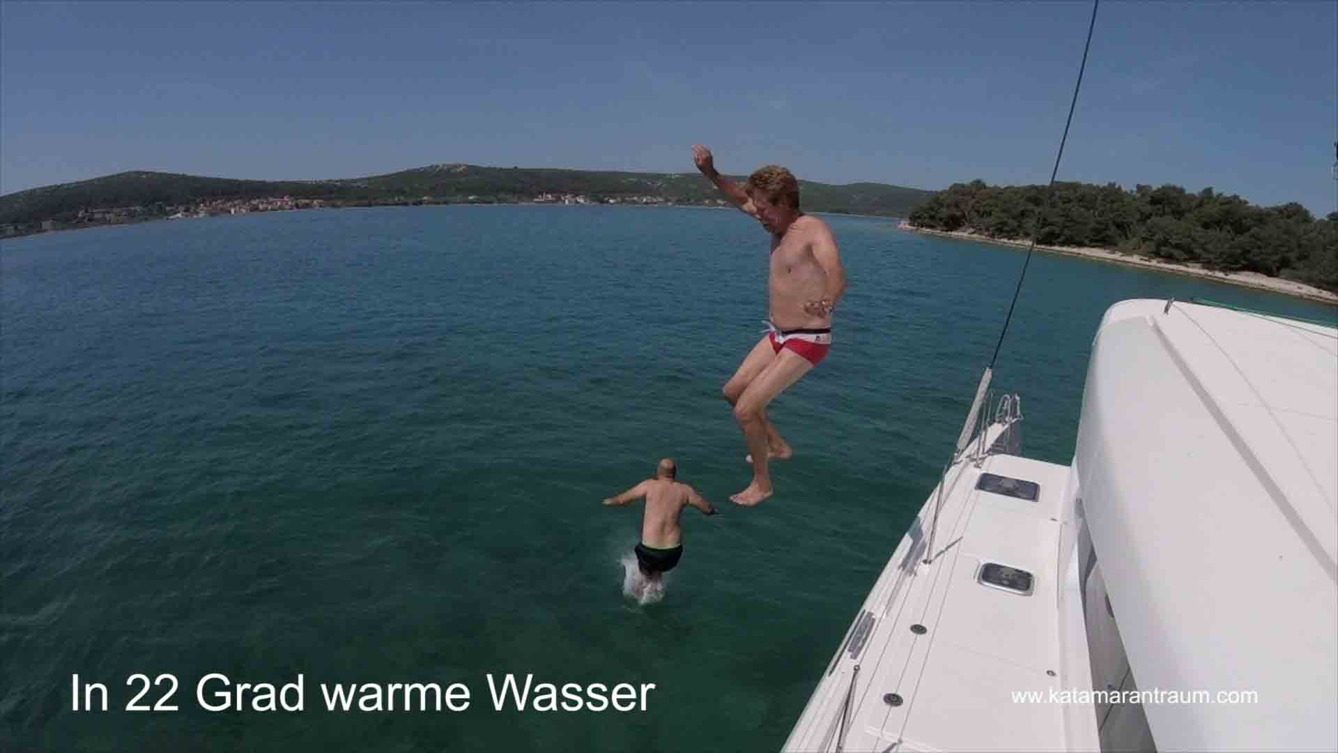 Skipper Jos and catamaran guest Attila go to sea