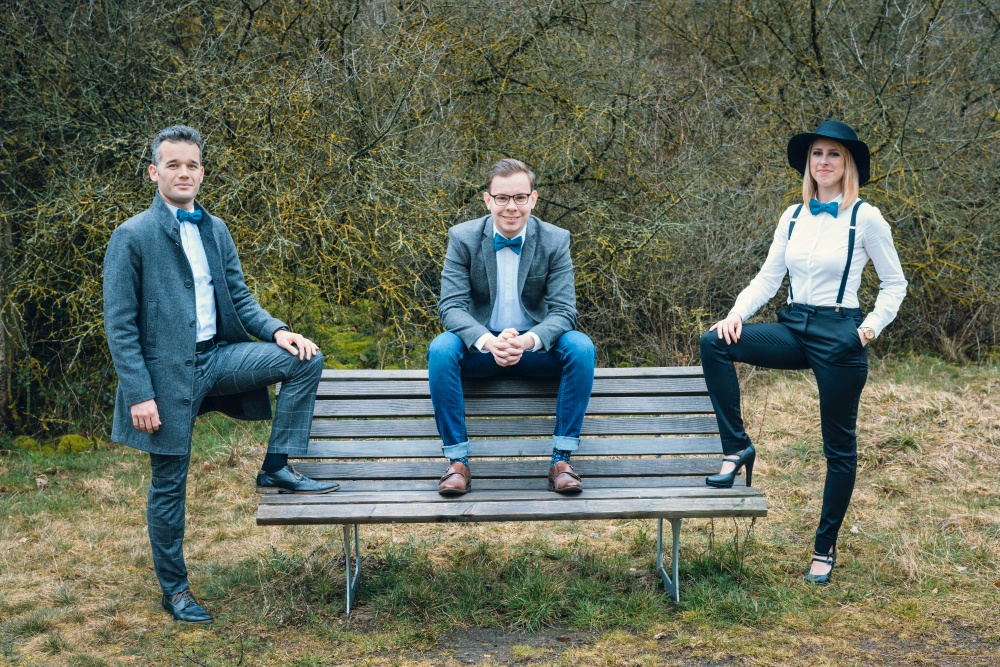 Fabowlossi Team mit petroler Motto Fliege zum Binden