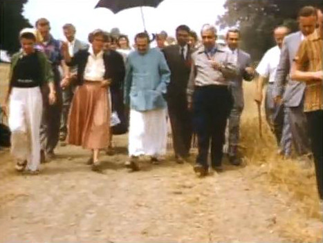 Meher Mount 1956 ; Adi K Irani on Baba's right with Eruch holding the umbrella. 1956 :  Image captured by Anthony Zois from a film by Sufism Reoriented