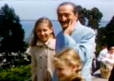 1956 ; Coit Tower - Meher Baba and his entourage are taking in the view of the harbour. Diane Dimpfl ( 3-B ) later Cobb standing next to Baba in the light coat.