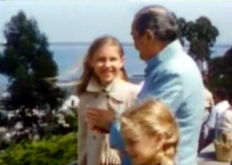 1956 ; Coit Tower - Meher Baba and his entourage are taking in the view of the harbour. Diane Dimpfl ( 3-B ) later Cobb standing next to Baba in the light coat.