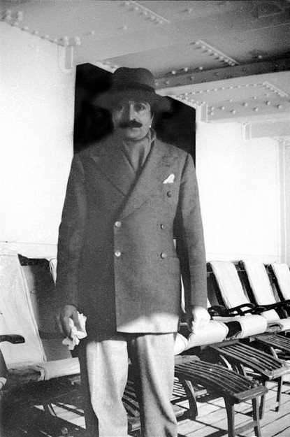 Mid 1930s on board a ship - Meher Baba incognito wearing a Western suit.