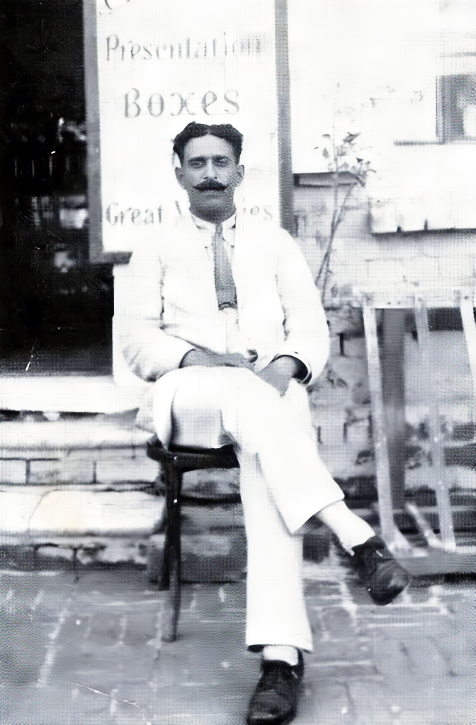 Rusi in front of his store in Quetta, Br. India. Courtesy of Lord Meher - V2  p.527