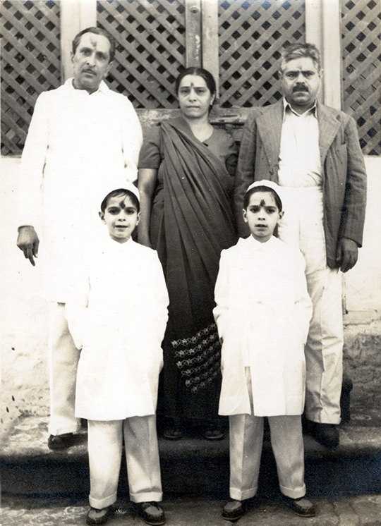  Baba House in Poona in the early 1950's. Standing back from left at Beheram and his wife Perin Irani & their twins, with unknown man. Courtesy of the Jessawala Collection - AMB Archives, Meherabad, India.