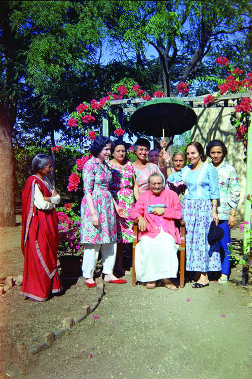 Meher Baba with his women mandali at Meherazad's garden.