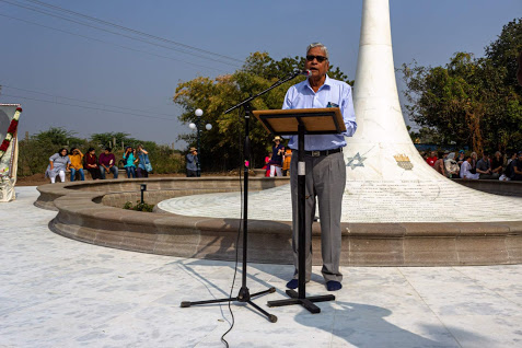 Shridhar Kelkar performing his opening address as Chairman of the A.M.B. Trust of India