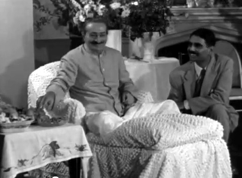 Meher Baba with Eruch Jessawala at the Hotel Delcomnico, New York City, NY.