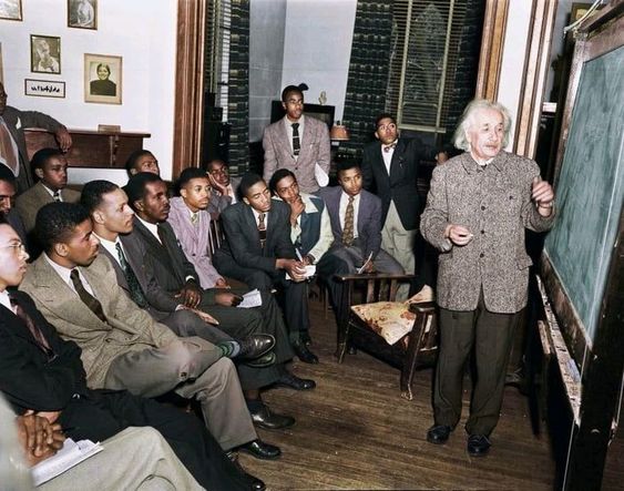Albert Einstein teaching physics to a class of young black men at Lincoln University -1946