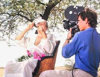 photo of MMeher Baba in Upper Meherazad, while being filmed for the 'Beyond Word' film, 1967