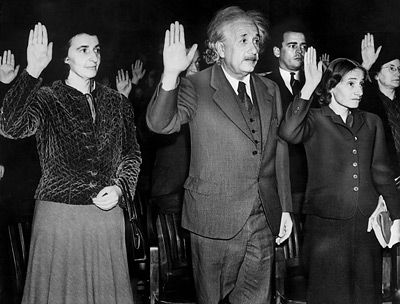 Albert Einstein, his secretary Helen Dukas, left, and his step-daughter Margot Einstein, right, take the oath of U.S. citizenship, October 1, 1940