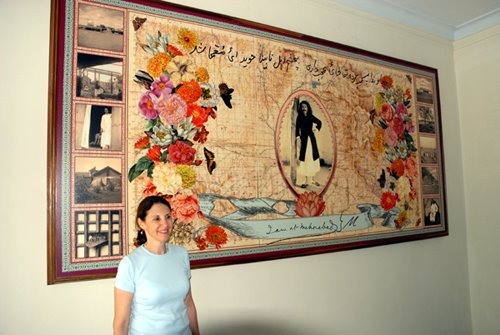 Beth Ganz in front of her composition (digitally created) in the Dining Hall at Meherabad, India