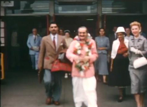 Marion with white hand-bag