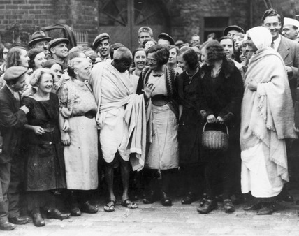 Gandhi with cotton mill workers  in Central England