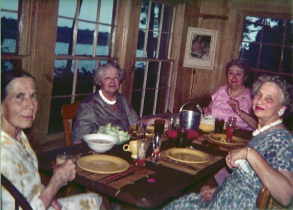 Original Kitchen, Meher Center, probably in the 1960s. — (L-R) Kitty Davy, Elizabeth Patterson, Murshida Ivy Duce and Laura DeLavigne