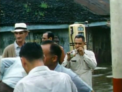 India ; Fred wearing hat. Adi S.Irani drinking from bottle.