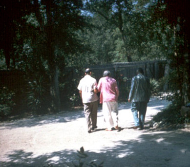 1958 - Baba exercising with Darwin Shaw inside the compound