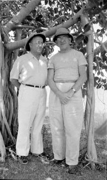 1954, India : Fred ( left ) standing next to John Bass 