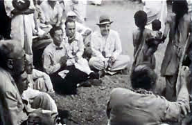 1954 , Meherabad, India ; Hitaka sitting with his hands together