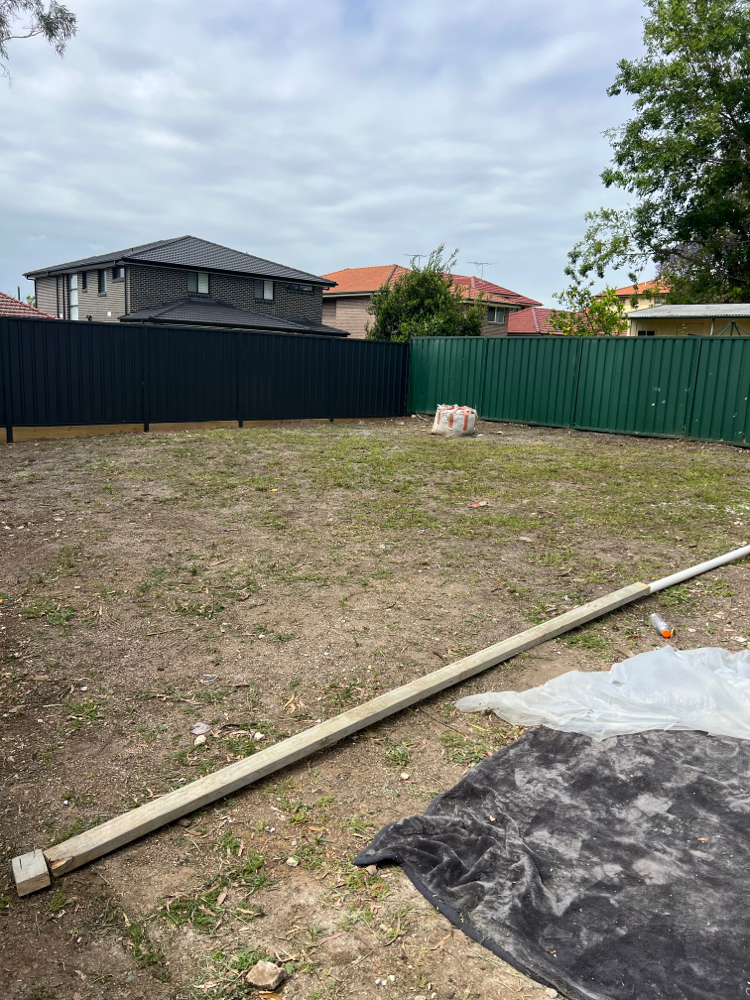 Laying new buffalo grass with new soil 