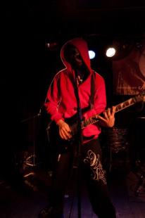 Performing on stage, becoming the number 1 band of the night to advance to the band contest semi-finals.
