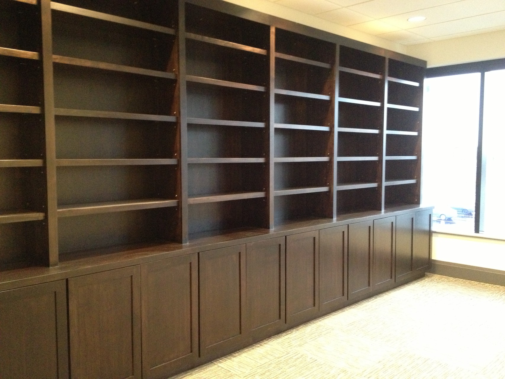 Custom Bookshelves - Stained and finished on site