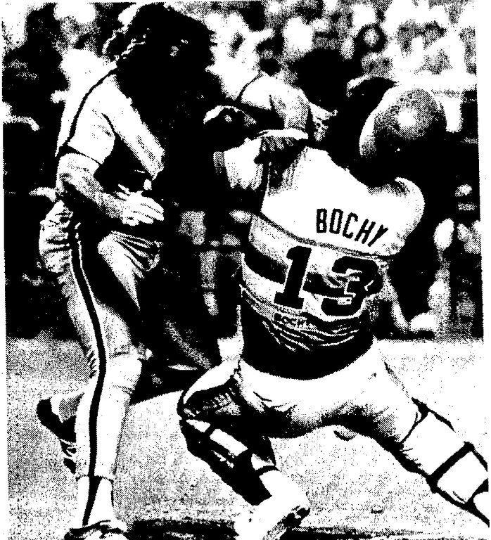 Pete Rose scored on Luzinski's double, knocking over Astros catcher Bruce Bochy in the process.