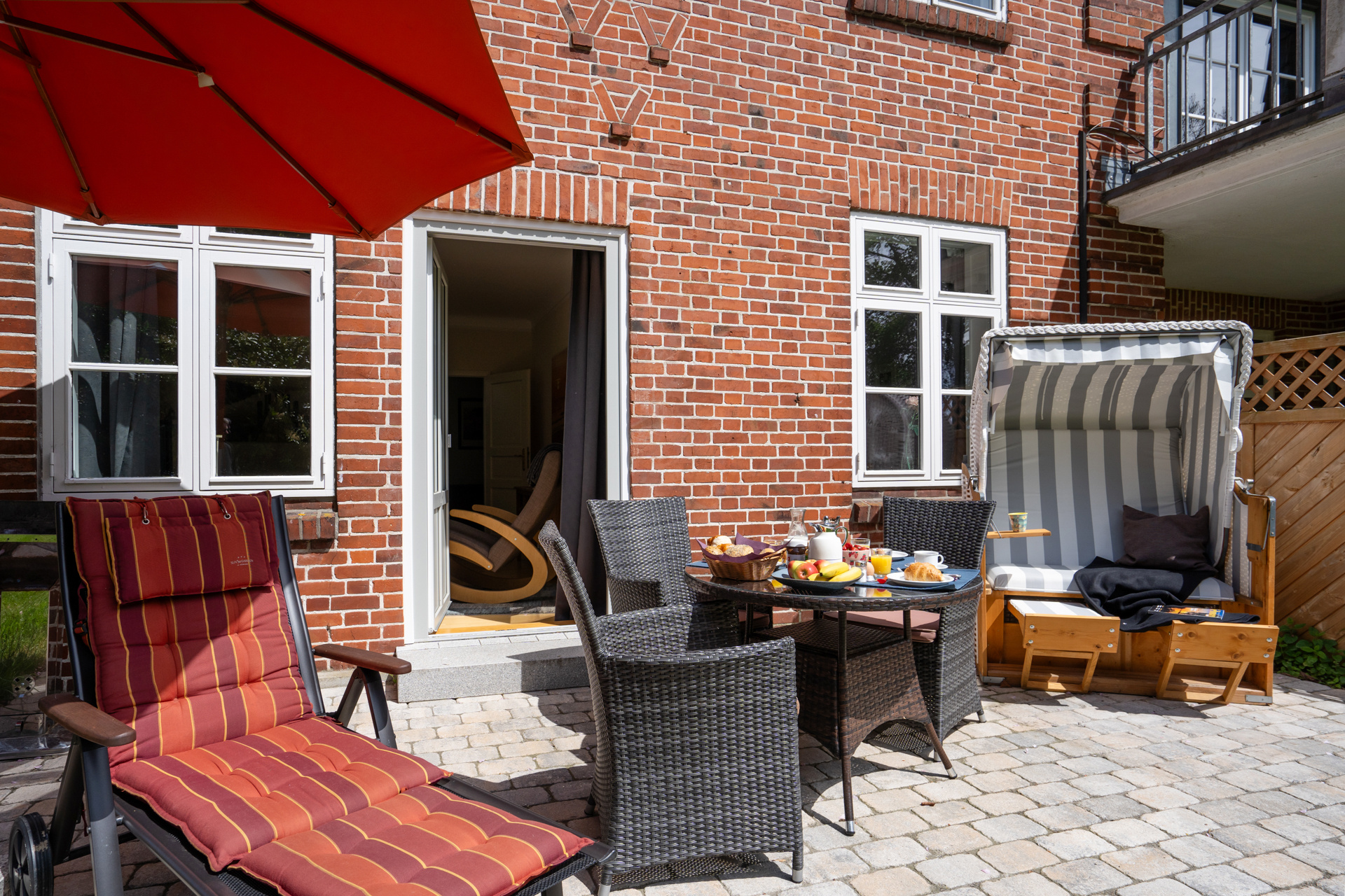 Ferienwohnung im charmanten Bauernhaus: Klassisches rotes Backsteingebäude bei fehmarn-mein-urlaub.de.