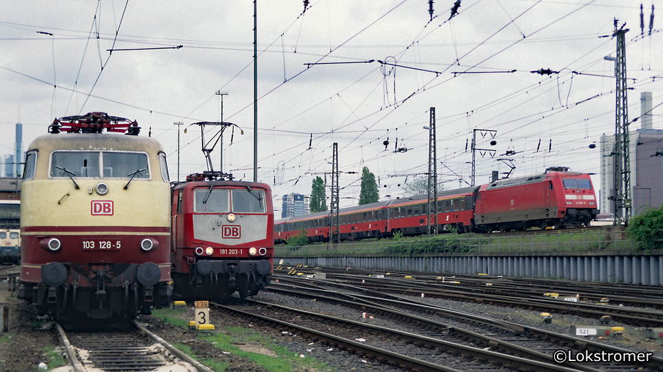 DB 101 001 passiert am 26. April 1998 mit ÖBB-EC in Richtung Ruhrgebiet den Betriebshof Frankfurt/M. 1, wo 103 128 und 181 203 auf den nächsten Einsatz warten.